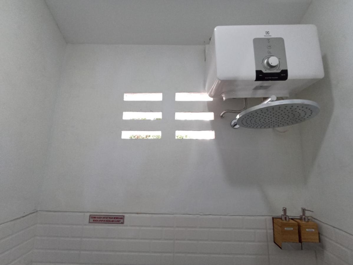 Mruyung Guest House Kota Lama Banyumas Mitra Reddoorz エクステリア 写真