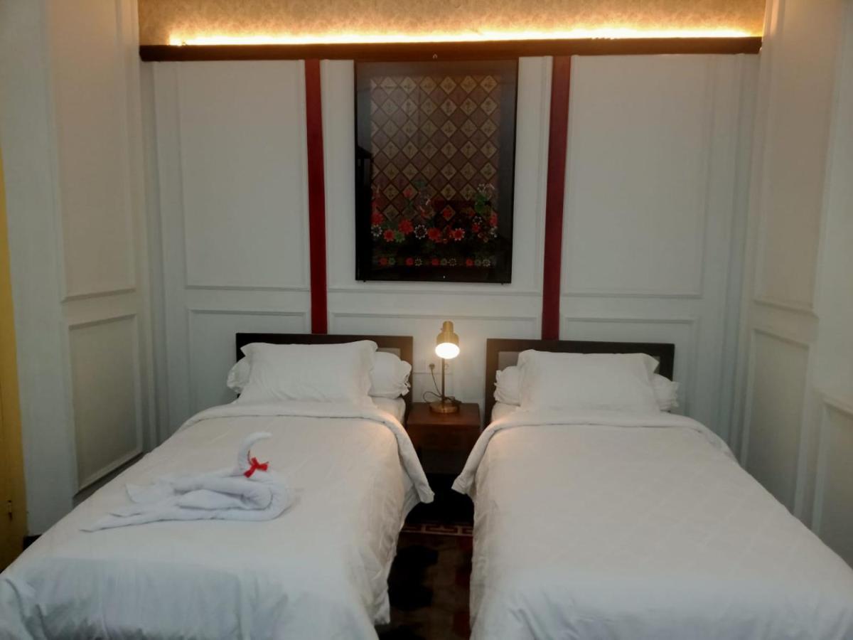Mruyung Guest House Kota Lama Banyumas Mitra Reddoorz エクステリア 写真